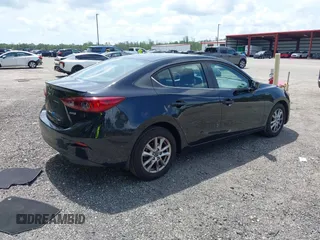 2016 Mazda 3 i Touring with VIN 3MZBM1V71GM298748, listed as a IAAI auction lot 42389384 with 65,564 mi miles and . Bid and sale history available at DreamBid. Image 4.