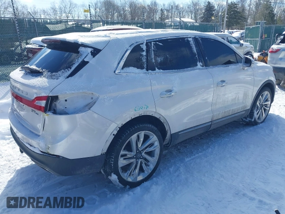2017 Lincoln MKX Reserve with VIN 2LMPJ8LP8HBL40591, listed as a IAAI auction lot 41307767 with 99,601 mi miles and . Bid and sale history available at DreamBid. Image 4.