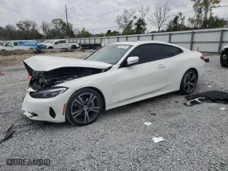 2023 BMW 4 Series 430i with VIN WBA53AP00PCL74865, listed as a Copart auction lot 89057895 with 9,000 mi miles and Salvage Title. Bid and sale history available at carsss.com. Image 1.