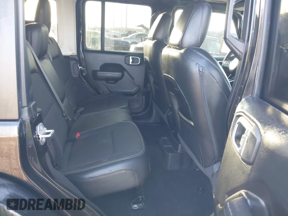 2023 Jeep Wrangler Sport S with VIN 1C4HJXDG2PW582318, listed as a IAAI auction lot 42011653 with 25,338 mi miles and . Bid and sale history available at DreamBid. Image 8.