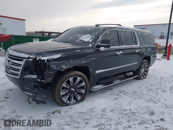 2015 Cadillac Escalade ESV Platinum z VIN 1GYS4UKJ0FR746571, wystawiony jako IAAI lot #38461309 z przebiegiem 65 724 mil mil oraz . Historia ofert i sprzedaży dostępna na DreamBid. Obrazek 17.