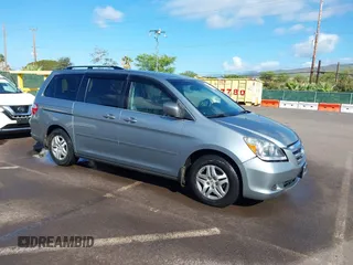 2007 Honda Odyssey EX-L with VIN 5FNRL38677B021464, listed as a IAAI auction lot 41568582 with 131,359 mi miles and . Bid and sale history available at carsss.com. Image 1.