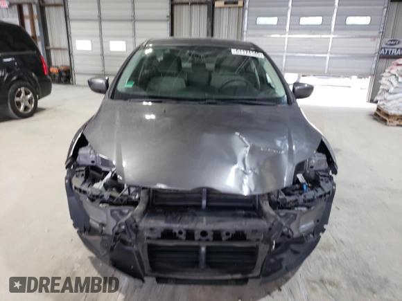 2012 Ford Focus SE z VIN 1FAHP3F28CL444261, wystawiony jako Copart lot #61174145 z przebiegiem 77 612 mil mil oraz Szkoda całkowita • Salvage title. Historia ofert i sprzedaży dostępna na DreamBid. Obrazek 5.