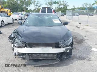 2020 Honda Civic Si with VIN 2HGFC1E50LH702493, listed as a IAAI auction lot 40609245 with 62,660 mi miles and . Bid and sale history available at DreamBid. Image 6.