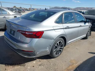 2023 Volkswagen Jetta Sport with VIN 3VWBM7BU5PM016768, listed as a IAAI auction lot 41427777 with 32,950 mi miles and . Bid and sale history available at DreamBid. Image 4.