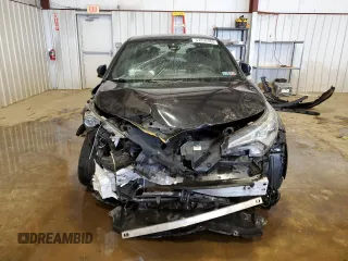 2018 Toyota C-HR XLE z VIN NMTKHMBX0JR041387, wystawiony jako Copart lot #57050385 z przebiegiem Nie podano mil oraz Szkody całkowita. Historia ofert i sprzedaży dostępna na DreamBid. Obrazek 5.