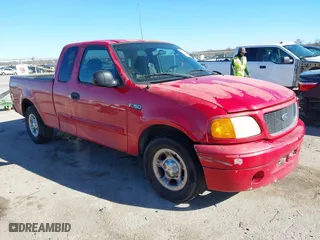 2004 Ford F-150 Heritage XL with VIN 2FTRX17214CA54597, listed as a IAAI auction lot 41206943 with 216,063 mi miles. Bid and sale history available at carsss.com. Image 1.