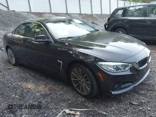 2014 BMW 4 Series 435i z VIN WBA3T3C5XEP737859, wystawiony jako IAAI lot #42462369 z przebiegiem 141 465 mil mil oraz . Historia ofert i sprzedaży dostępna na DreamBid. Obrazek 1.