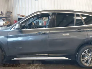 2016 BMW X1 xDrive28i with VIN WBXHT3C3XGP885359, listed as a IAAI auction lot 41743616 with 44,436 mi miles. Bid and sale history available at carsss.com. Image 14.