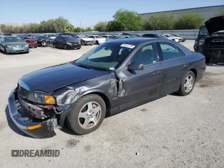 2000 Lincoln LS with VIN 1LNHM87A6YY857193, listed as a Copart auction lot 63065804 with 91,542 mi miles and Salvage Title. Bid and sale history available at carsss.com. Image 1.