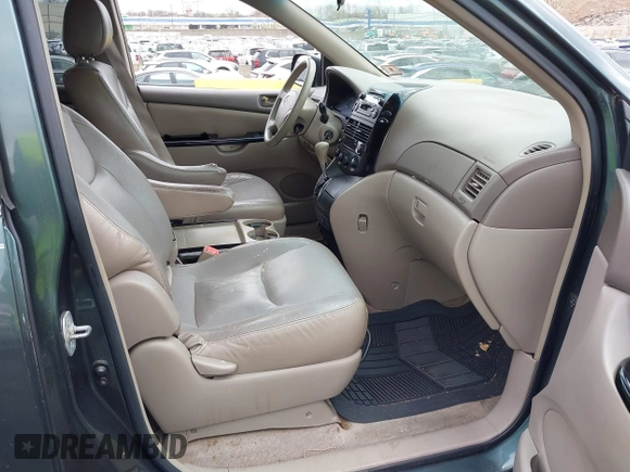 2005 Toyota Sienna CE with VIN 5TDZA23C55S280735, listed as a IAAI auction lot 42063994 with 201,883 mi miles. Bid and sale history available at carsss.com. Image 5.