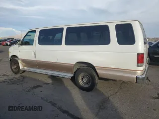 2000 Ford Econoline Passenger XL with VIN 1FBSS31L5YHA09064, listed as a Copart auction lot 84828844 with 257,973 mi miles and Salvage Title. Bid and sale history available at DreamBid. Image 2.