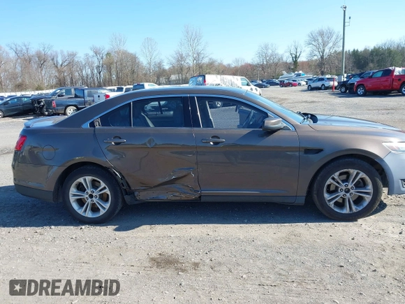 2015 Ford Taurus SEL with VIN 1FAHP2E83FG206055, listed as a IAAI auction lot 41943670 with 90,808 mi miles and . Bid and sale history available at carsss.com. Image 13.