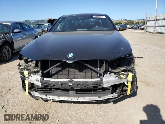 2019 BMW 5 Series M550i xDrive with VIN WBAJB9C50KB464503, listed as a Copart auction lot 56995825 with 67,324 mi miles and Salvage title. Bid and sale history available at DreamBid. Image 5.