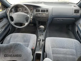 1995 Toyota Corolla DX with VIN 2T1AE09B5SC127586, listed as a Copart auction lot 57075045 with 244,969 mi miles and Salvage title. Bid and sale history available at DreamBid. Image 8.