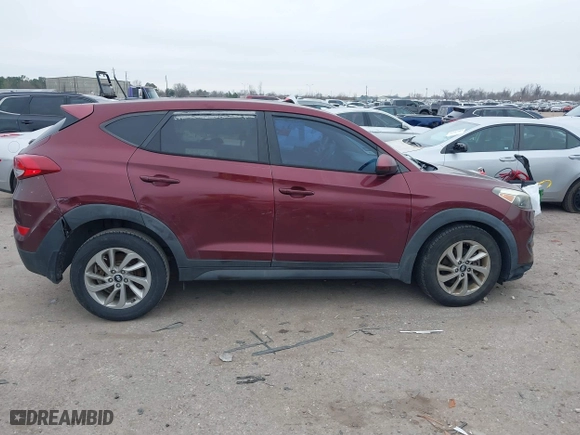 2016 Hyundai Tucson SE with VIN KM8J23A4XGU041915, listed as a IAAI auction lot 41573038 with 101,937 mi miles. Bid and sale history available at carsss.com. Image 13.