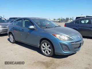 2011 Mazda 3 i Touring z VIN JM1BL1VG2B1441007, wystawiony jako IAAI lot #42542608 z przebiegiem 148 055 mil mil oraz . Historia ofert i sprzedaży dostępna na DreamBid. Obrazek 1.
