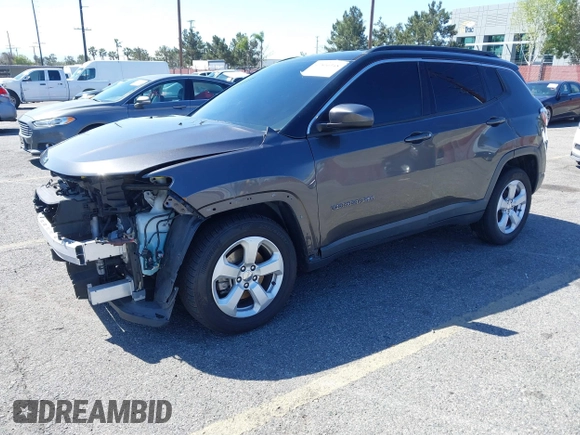 2020 Jeep Compass Altitude with VIN 3C4NJCBB0LT134047, listed as a IAAI auction lot 41806348 with 70,533 mi miles and . Bid and sale history available at carsss.com. Image 18.