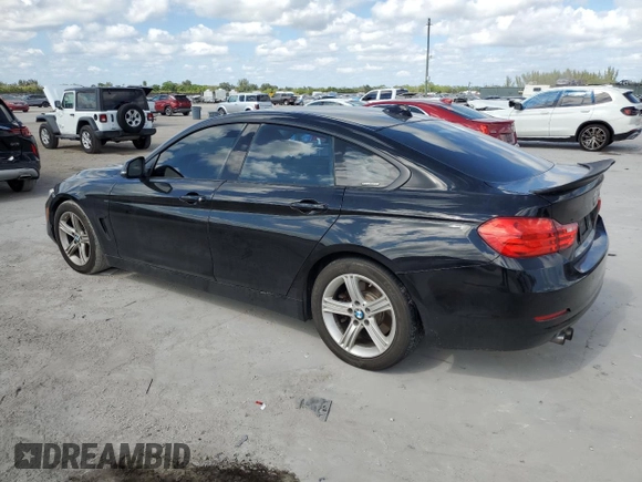 2015 BMW 4 Series 428i with VIN WBA4A5C55FD410360, listed as a Copart auction lot 44335485 with 144,997 mi miles and Salvage Title. Bid and sale history available at DreamBid. Image 2.
