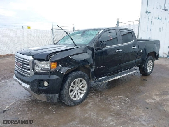 2016 GMC Canyon 4WD SLT with VIN 1GTG6DE3XG1106841, listed as a IAAI auction lot 40834705 with 121,810 mi miles. Bid and sale history available at carsss.com. Image 2.