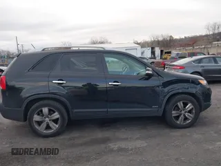 2013 Kia Sorento EX with VIN 5XYKUDA27DG413537, listed as a IAAI auction lot 40991803 with 163,534 mi miles. Bid and sale history available at carsss.com. Image 13.