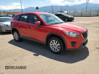 2016 Mazda CX-5 Sport with VIN JM3KE4BYXG0702655, listed as a Copart auction lot 63120205 with 64,403 mi miles and Salvage title. Bid and sale history available at DreamBid. Image 4.