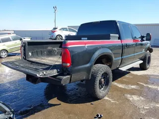1999 Ford Super Duty F-250 XL with VIN 1FTNW21F3XEA73346, listed as a IAAI auction lot 41720350 with 193,884 mi miles. Bid and sale history available at carsss.com. Image 4.