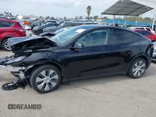 2023 Tesla Model Y Long Range z VIN 7SAYGDEE2PF863200, wystawiony jako IAAI lot #41805168 z przebiegiem 25 480 mil mil oraz . Historia ofert i sprzedaży dostępna na DreamBid. Obrazek 15.