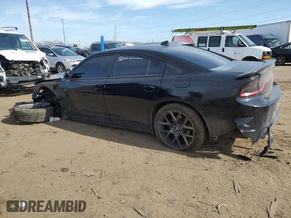 2019 Dodge Charger R/T with VIN 2C3CDXCT4KH721649, listed as a Copart auction lot 49768705 with 101,490 mi miles and Salvage Title. Bid and sale history available at carsss.com. Image 2.