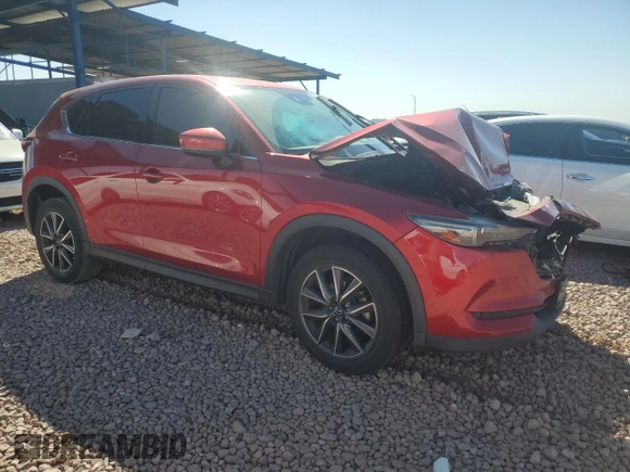2017 Mazda CX-5 Grand Touring with VIN JM3KFBDL0H0118057, listed as a Copart auction lot 50121335 with 148,275 mi miles and Salvage Title. Bid and sale history available at carsss.com. Image 4.