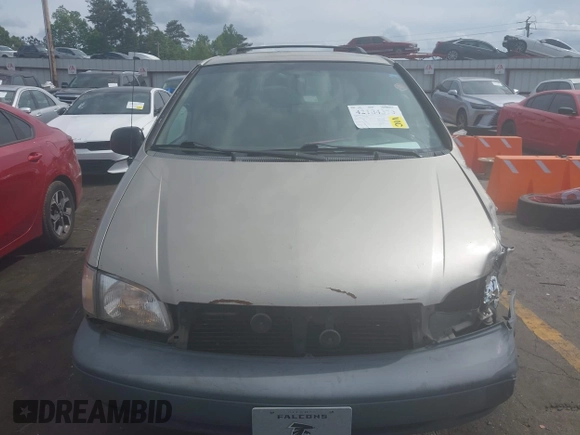 2000 Toyota Sienna LE z VIN 4T3ZF13C4YU309866, wystawiony jako IAAI lot #42184370 z przebiegiem 176 171 mil mil oraz . Historia ofert i sprzedaży dostępna na DreamBid. Obrazek 12.