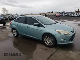 2012 Ford Focus SE with VIN 1FAHP3F21CL142407, listed as a Copart auction lot 48551205 with 174,935 mi miles and Salvage Title. Bid and sale history available at carsss.com. Image 4.