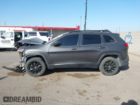 2014 Jeep Cherokee Latitude with VIN 1C4PJMCBXEW317384, listed as a IAAI auction lot 41621635 with 180,971 mi miles and . Bid and sale history available at DreamBid. Image 15.
