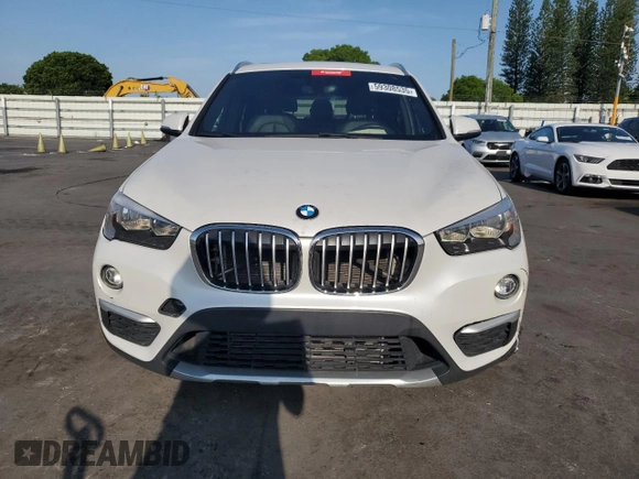 2018 BMW X1 sDrive28i z VIN WBXHU7C39J5H42980, wystawiony jako Copart lot #59308535 z przebiegiem 122 135 mil mil oraz Czysty tytuł • Clean title. Historia ofert i sprzedaży dostępna na DreamBid. Obrazek 5.
