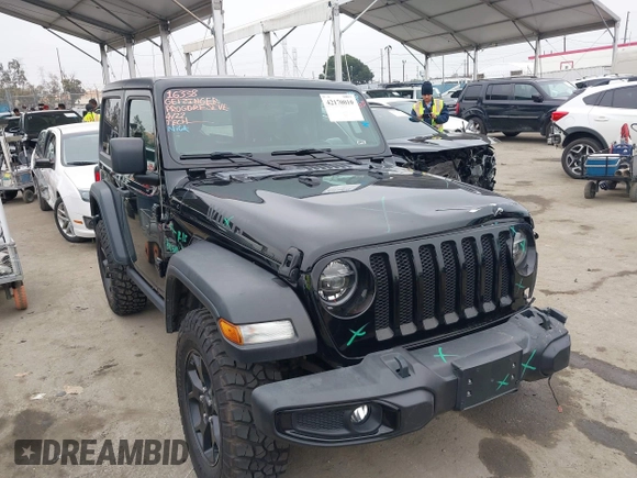 2021 Jeep Wrangler Sport with VIN 1C4GJXAN5MW627228, listed as a IAAI auction lot 42170010 with 56,965 mi miles and . Bid and sale history available at DreamBid. Image 1.