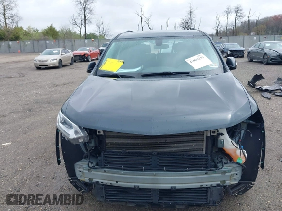 2018 Chevrolet Traverse LT Cloth z VIN 1GNEVGKW7JJ156198, wystawiony jako IAAI lot #41909259 z przebiegiem 82 719 mil mil oraz . Historia ofert i sprzedaży dostępna na DreamBid. Obrazek 13.