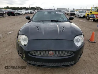 2007 Jaguar XK XKR with VIN SAJWA44C879B19251, listed as a Copart auction lot 50807595 with 100,715 mi miles and Salvage Title. Bid and sale history available at DreamBid. Image 5.