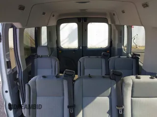 2015 Ford Transit Passenger XL z VIN 1FBAX2CG7FKA75719, wystawiony jako IAAI lot #42135118 z przebiegiem Nie podano mil oraz . Historia ofert i sprzedaży dostępna na DreamBid. Obrazek 18.