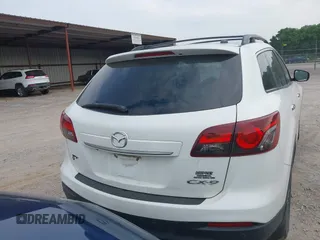 2015 Mazda CX-9 Grand Touring with VIN JM3TB2DA7F0448886, listed as a IAAI auction lot 42440203 with 108,765 mi miles and . Bid and sale history available at DreamBid. Image 16.