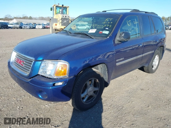 2006 GMC Envoy SLT with VIN 1GKDT13S762170322, listed as a IAAI auction lot 41324540 with 999,999 mi miles. Bid and sale history available at carsss.com. Image 2.