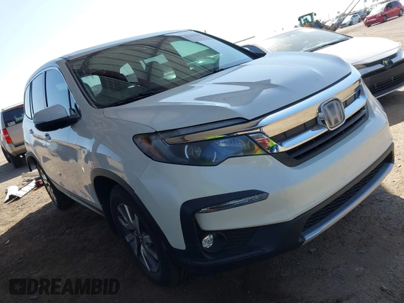 2019 Honda Pilot EX-L z VIN 5FNYF6H52KB083410, wystawiony jako IAAI lot #42290286 z przebiegiem 95 534 mil mil oraz . Historia ofert i sprzedaży dostępna na DreamBid. Obrazek 1.