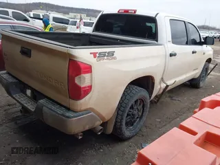 2016 Toyota Tundra 4WD Truck SR5 with VIN 5TFDW5F13GX509045, listed as a IAAI auction lot 41554023 with 165,026 mi miles. Bid and sale history available at carsss.com. Image 4.