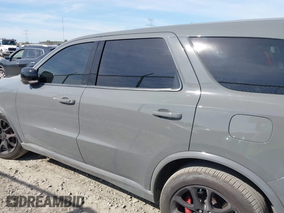 2023 Dodge Durango SRT Hellcat Premium with VIN 1C4SDJH95PC695459, listed as a IAAI auction lot 41856168 with 6,163 mi miles and . Bid and sale history available at DreamBid. Image 14.