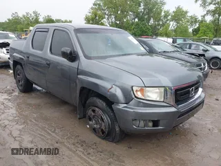 2010 Honda Ridgeline RT z VIN 5FPYK1F22AB001981, wystawiony jako IAAI lot #42432672 z przebiegiem 150 412 mil mil oraz . Historia ofert i sprzedaży dostępna na DreamBid. Obrazek 1.