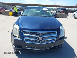 2008 Cadillac CTS AWD z VIN 1G6DH577980158801, wystawiony jako IAAI lot #41805061 z przebiegiem 99 579 mil mil oraz . Historia ofert i sprzedaży dostępna na DreamBid. Obrazek 13.