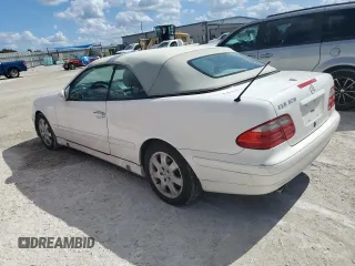 2003 Mercedes-Benz CLK-Class 3.2L with VIN WDBLK65G73T135929, listed as a Copart auction lot 76175704 with 114,677 mi miles and Salvage Title. Bid and sale history available at carsss.com. Image 2.