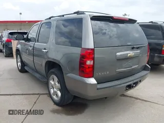 2007 Chevrolet Tahoe LTZ with VIN 1GNFC13J37J399493, listed as a IAAI auction lot 42656195 with 231,950 mi miles and . Bid and sale history available at DreamBid. Image 3.