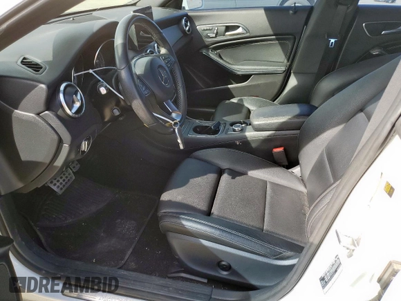 2018 Mercedes-Benz CLA 250 with VIN WDDSJ4EB8JN683857, listed as a Copart auction lot 48227595 with 74,437 mi miles and Clean Title. Bid and sale history available at DreamBid. Image 7.