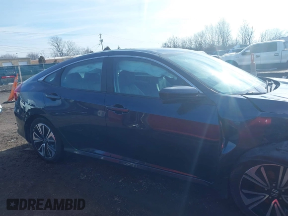2017 Honda Civic Sedan EX-L with VIN 19XFC1F79HE020486, listed as a IAAI auction lot 41694311 with 77,391 mi miles. Bid and sale history available at carsss.com. Image 13.