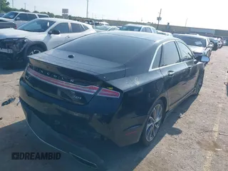2018 Lincoln MKZ Select z VIN 3LN6L5C90JR625598, wystawiony jako IAAI lot #42189498 z przebiegiem 98 803 mil mil oraz . Historia ofert i sprzedaży dostępna na DreamBid. Obrazek 4.